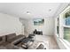 Bright living room features neutral walls, plush carpeting, and modern furnishings at 109 Landon Ct, Shelby, NC 28152
