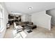 Spacious living room with plush seating area that connects to dining and kitchen at 109 Landon Ct, Shelby, NC 28152