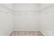 Walk-in closet featuring wire shelving and neutral carpet at 109 Landon Ct, Shelby, NC 28152