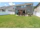 Backyard with a well-maintained lawn, patio with pergola, perfect for outdoor entertaining at 1109 Saratoga Blvd, Indian Trail, NC 28079
