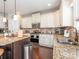 Bright kitchen featuring stainless appliances, granite counters, and a center island at 1109 Saratoga Blvd, Indian Trail, NC 28079