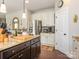 Modern kitchen with granite countertops, stainless steel appliances, and bright white cabinetry at 1109 Saratoga Blvd, Indian Trail, NC 28079