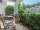 Cozy front porch with rocking chairs and landscaping provides a welcoming entry at 1109 Saratoga Blvd, Indian Trail, NC 28079