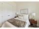 Cozy bedroom featuring a comfortable bed, bedside tables, and a closet at 1120 Idyllic Ln, Waxhaw, NC 28173