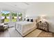 Bright bedroom with ample natural light showcasing large windows and neutral decor at 1120 Idyllic Ln, Waxhaw, NC 28173