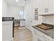 Well-lit laundry room with modern appliances and counter space at 1120 Idyllic Ln, Waxhaw, NC 28173