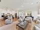 Open living and kitchen area featuring modern appliances, stylish decor, and ample natural light at 1120 Idyllic Ln, Waxhaw, NC 28173