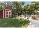 Backyard featuring a storage shed and patio with outdoor seating area at 1219 Flowe Dr, Matthews, NC 28104