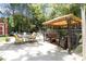 Backyard patio with outdoor seating area and gazebo at 1219 Flowe Dr, Matthews, NC 28104