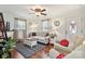 Comfortable living room with stylish decor, hardwood floors, and ample natural light at 1219 Flowe Dr, Matthews, NC 28104