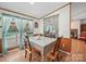 Charming dining area with natural light, wooden floors, and a decorative fireplace view at 130 Benton Rd, Kings Mountain, NC 28086