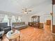Comfortable living room with wood-look floors, neutral wall paint, and ample natural light at 130 Benton Rd, Kings Mountain, NC 28086
