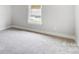 Bright bedroom featuring neutral carpet and natural light streaming through the window at 1425 Ardmore Dr # 247, Sherrills Ford, NC 28673