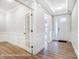 Bright foyer with hardwood floors, decorative wainscoting, and a view of the front door at 1425 Ardmore Dr # 247, Sherrills Ford, NC 28673