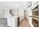Bright, open kitchen features white cabinets, stainless appliances, and a large center island at 1425 Ardmore Dr # 247, Sherrills Ford, NC 28673