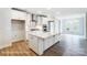 Modern kitchen with a large center island, white cabinets, and stainless steel appliances at 1425 Ardmore Dr # 247, Sherrills Ford, NC 28673