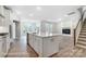 Modern kitchen boasts a large island, stainless appliances, and open flow to the living area at 1425 Ardmore Dr # 247, Sherrills Ford, NC 28673