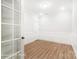 Well-lit home office space features wood floors and classic paneled wainscoting at 1425 Ardmore Dr # 247, Sherrills Ford, NC 28673