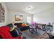Inviting living room featuring a comfortable sectional sofa, play table and modern decor at 154 King William Dr, Mooresville, NC 28115