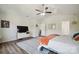 Spacious main bedroom with ceiling fan, hardwood floors, and adjacent bathroom access at 154 King William Dr, Mooresville, NC 28115
