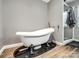 Luxurious bathroom showcasing a clawfoot tub and a separate glass-enclosed shower at 165 Cottontail Se Ln, Concord, NC 28025