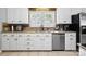 Kitchen features stainless steel dishwasher and sink, with ample storage at 165 Cottontail Se Ln, Concord, NC 28025