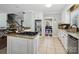 Well-lit kitchen features stainless steel appliances and granite countertops at 165 Cottontail Se Ln, Concord, NC 28025
