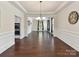 Spacious dining room features hardwood floors, crown molding, and plenty of space for hosting at 17012 Alydar Commons Ln, Charlotte, NC 28278