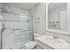 Elegant bathroom with marble-look tile, a glass-enclosed shower, and modern fixtures at 17733 Burnt Hickory Dr, Charlotte, NC 28278