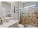 Well-lit bathroom with a glass-enclosed shower, neutral tile, and modern fixtures creating a spa-like ambiance at 17733 Burnt Hickory Dr, Charlotte, NC 28278