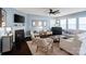 Inviting living room featuring a fireplace, hardwood floors, and neutral décor at 17733 Burnt Hickory Dr, Charlotte, NC 28278