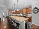Spacious kitchen features a large island with seating, granite countertops, and stainless steel appliances at 1808 Mill Chase Ln, Waxhaw, NC 28173