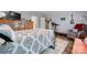 Bedroom featuring a comfortable bed, a storage cabinet, and a cozy atmosphere at 200 Vista Pointe Dr, Stony Point, NC 28678