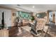 Inviting living room features stylish decor, comfortable seating, and wood-look floors at 200 Vista Pointe Dr, Stony Point, NC 28678
