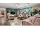 Comfortable living room with stylish decor, plush seating, and a large window for natural light at 200 Vista Pointe Dr, Stony Point, NC 28678