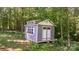 Exterior of a well-maintained outbuilding with decorative windows at 200 Vista Pointe Dr, Stony Point, NC 28678
