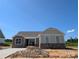 Charming single-story home featuring stone accents and a modern design at 2093 Fordhill St, Rock Hill, SC 29732
