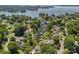 An aerial perspective of a waterfront community, showcasing homes with boat docks and water access at 21212 Rio Oro Dr, Cornelius, NC 28031