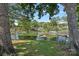 Picturesque waterfront backyard with a tranquil view of the lake and swaying swing at 21212 Rio Oro Dr, Cornelius, NC 28031