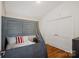 Bedroom featuring a bunk bed, wood floors, and neutral color palette at 21212 Rio Oro Dr, Cornelius, NC 28031