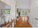 Bright entryway boasting hardwood floors and French doors to outdoor living space at 21212 Rio Oro Dr, Cornelius, NC 28031