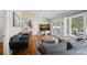 Comfortable living room showcasing hardwood floors and ample natural light at 21212 Rio Oro Dr, Cornelius, NC 28031