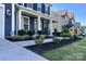 Inviting front entrance featuring manicured landscaping, a well-maintained lawn, and a welcoming walkway at 235 Boxelder Rd, Clover, SC 29710