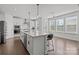 Bright kitchen with a large island, stainless steel appliances, and ample counter space at 235 Boxelder Rd, Clover, SC 29710
