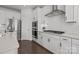 Updated kitchen features white cabinets, stainless appliances, a gas cooktop, and modern hardware at 235 Boxelder Rd, Clover, SC 29710