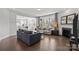 Bright and airy living room featuring a fireplace, hardwood floors, and open floor plan at 235 Boxelder Rd, Clover, SC 29710