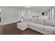 Bright living room with plush seating, hardwood floors, and a view of the stairs at 235 Boxelder Rd, Clover, SC 29710