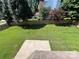 Expansive backyard with lush green lawn and privacy fence, perfect for outdoor activities at 2609 Lamp Post Ln, Kannapolis, NC 28081