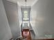 Bright foyer featuring hardwood floors, high ceilings, and elegant lighting at 2609 Lamp Post Ln, Kannapolis, NC 28081