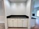 Charming alcove with granite countertop and white cabinets at 2609 Lamp Post Ln, Kannapolis, NC 28081